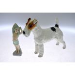 A Royal Doulton fox terrier 'Crackley Startler' HN1007, to/w a Royal Doulton figure 'To Bed' (2)