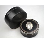 An 18th century Continental tortoiseshell trinket box of cylindrical form,