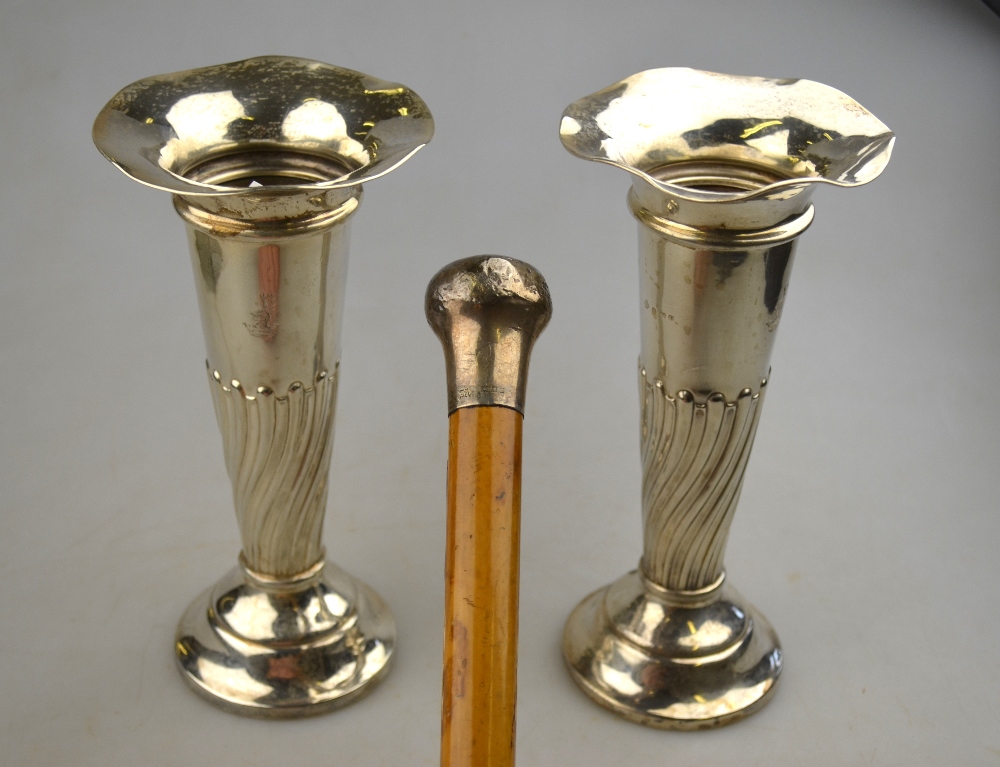 A pair of silver tapering vase-flutes with flared rims and reeded and fluted stems,