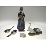 A Royal Copenhagen model of two geese and model of a pair of ducklings to/w two Bing & Grondahl