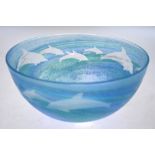 A Malcolm Sutcliffe design studio glass bowl with swirling blue decoration cut with dolphin designs,