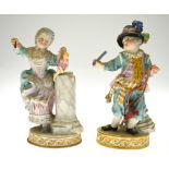 A pair of late 19th century Meissen figures of children at play, she spanking her doll and he with a