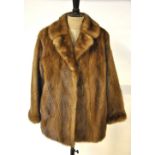 A taupe mink fur jacket with neat collar and revere, 53 cm across chest, brown satin lining