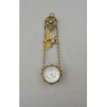 A lady's gilt metal and crystal pendant watch of flattened spherical form, stamped S. Fres. & Cie,