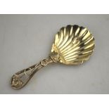 A Victorian silver caddy spoon with shell bowl and open-work vine handle, George Unite, Birmingham