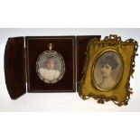 An oval portrait miniature on ivory of a young girl, signed with monogram VC,