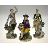 A pair of Sitzendorf porcelain figures, 18 cm to/w a Sitzendorf figure of a seated youth, 14 cm