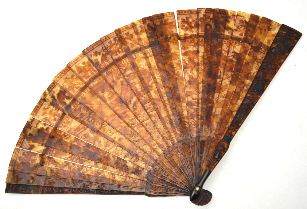 A Chinese carved tortoiseshell fan,