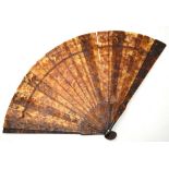 A Chinese carved tortoiseshell fan,