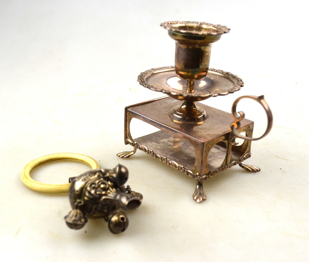 An Edwardian silver baby's rattle with ivorine teether ring and four bells, Crisford & Norris Ltd.