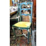 A set of twelve 18th century style polychrome decorated side chairs each having shaped bar backs