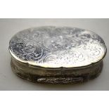 A 19th century Continental unmarked metal oval snuff-box with agate-set cover and foliate engraving,