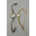 A lady's 9ct gold Rotary wristwatch with 21 jewel movement and silvered dial,