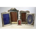 Five various silver-faced photograph frames