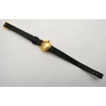 A lady's 18kt Omega Ladymatic wristwatch with 24-jewel automatic movement,