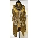 A 1920s embossed gold lame heavily beaded evening cloak (reputedly belonging to Fay Compton or