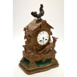 A 19th century French gilt spelter and bronzed mantel clock,