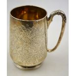 A Victorian foliate-engraved silver Christening mug, Chawner & Co., London 1876, 5.