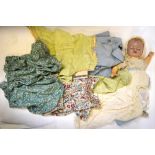 A box of vintage children's clothing to include; floral printed silk dress and matching bloomers,