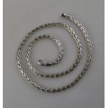 A white metal rope style chain, stamped 750, approx 17.