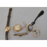 A lot containing shell cameo brooch, 18k wristwatch, pendant,