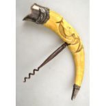 A Continental corkscrew, the boar's tusk handle carved with a deer, with white metal end mounts,