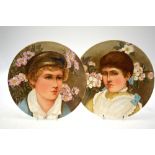 A pair of Victorian plates painted with a young girl and boy, signed Mary Salisbury, June 1880,