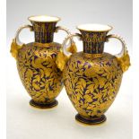 A pair of Victorian Royal Crown Derby twin handle vases,