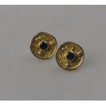 A pair of circular sapphire-set earrings, matt 18ct yellow and white gold to match lot 223,