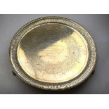 A Victorian silver salver with beaded rim and reeded border,