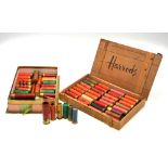 An interesting collection of 66 vintage paper-cased shotgun cartridges - various sizes from 4-bore