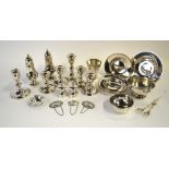 A quantity of electroplated table wares, including three pairs of candlesticks,