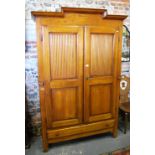 A 19th century fruitwood armoire, possibly of Swiss origin,