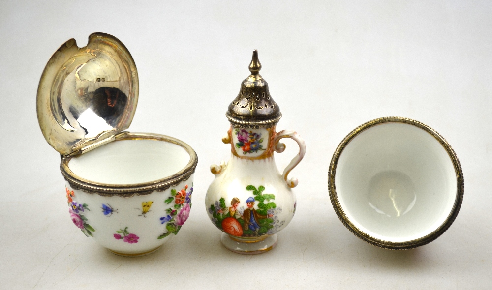 A 19th century Meissen white-metal salt and mustard pair embossed and printed with flowers and - Image 3 of 5