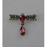 A synthetic ruby and rose diamond bar brooch having synthetic ruby and rose diamond drop