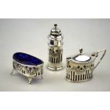 A late Victorian matched silver three-piece condiment set with chased garlands,