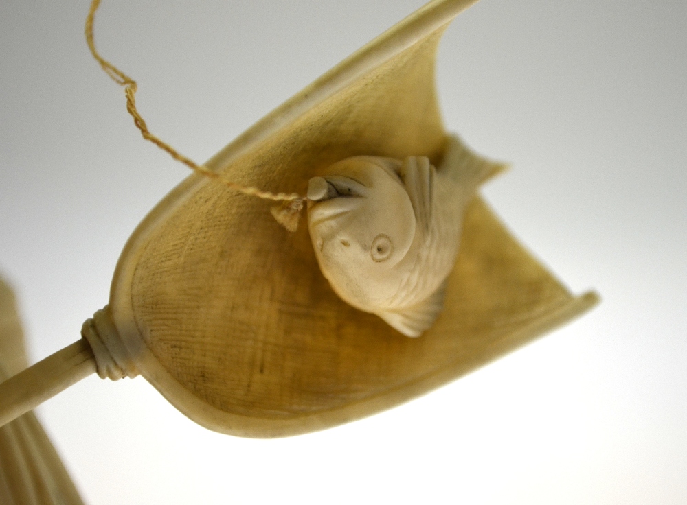 A Japanese Meiji period sectional carved ivory Okimono, fisherman with catching net (pole missing), - Image 2 of 5