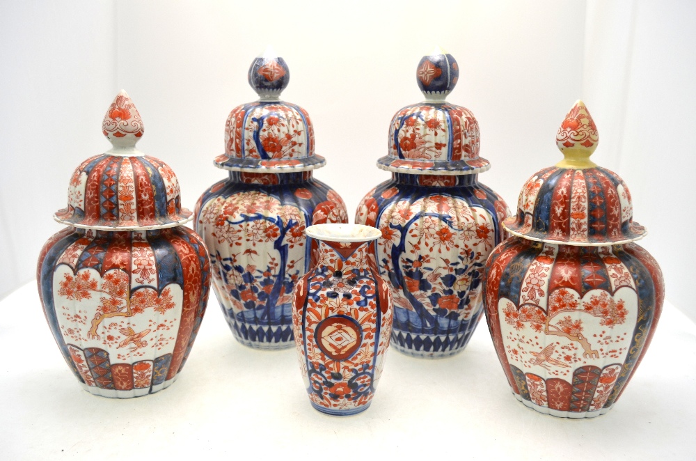 Two pairs of Japanese Imari vases, each vase with domed cover, 30 & 37 cm h.
