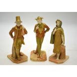Three Victorian Royal Worcester shot enamel figures, comprising a jester, no 2313, 17.