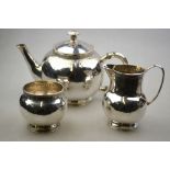 A silver bullet-shape three-piece tea service in the William & Mary manner, John Paul Cooper,