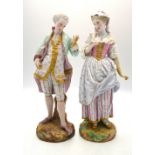 A pair of late 19th century Vion & Baury bisque figures of a lady and gentleman in 18th century