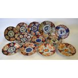 Twelve Japanese Imari dishes,