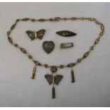 A Siamese niello-work necklace with butterfly pendant to/w matching butterfly brooch,