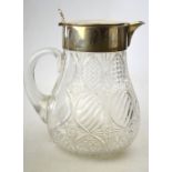A late Victorian cut glass punch jug with silver collar and cover, Drew & Sons of Piccadilly,