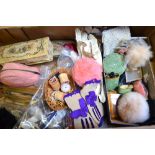 A box of assorted items to include swans-down powder puffs, vintage perfume bottle,