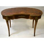 A 19th century ormolu mounted marquetry inlaid kingwood writing table of kidney form having a