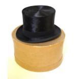 A black silk top hat retailed by G. A. Dunn & Co., 429 Strand, Oxford St., 57 cm dia.