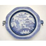 A Chinese export blue and white plate warmer decorated with a coastal landscape, 18th/19th century,