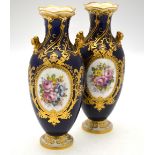 A pair of Royal Crown Derby twin handle vases,