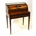A 19th century continental marquetry inlaid cylinder desk having a marble and gilt metal gallery